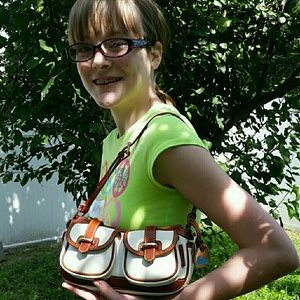 DOONEY AND BOURKE  LEATHER SADDLE HANDBAG